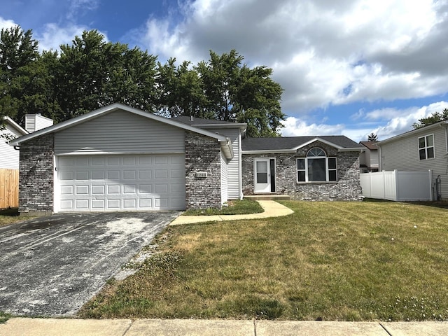 1244 Harvest Ln, University Park, IL 60484 - ranch-style house featuring driveway, an attached garage, and brick siding