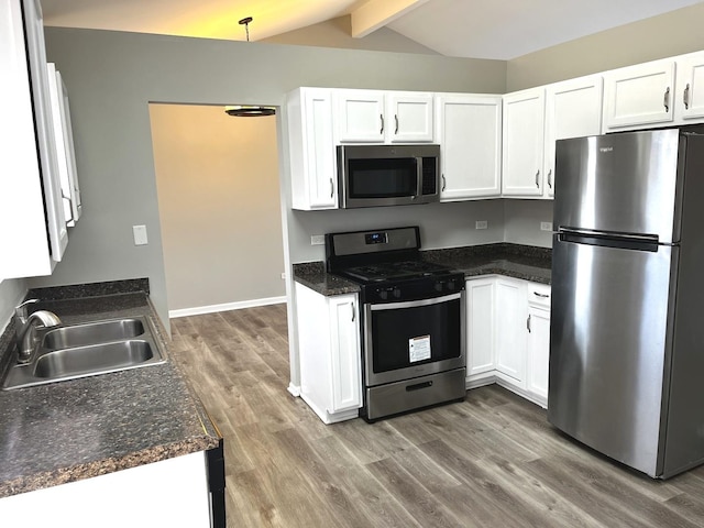 1244 Harvest Ln, University Park, IL 60484 - kitchen with stainless steel appliances, white cabinetry, and light wood-style flooring