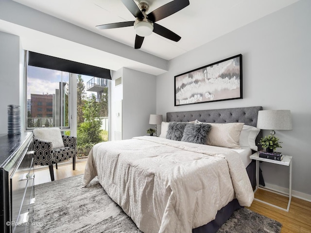 659 W Randolph St Unit 421, Chicago, IL 60661 - bedroom featuring wood finished floors, access to outside, and a ceiling fan