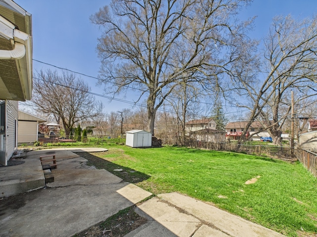 426 Norton Ave, Glendale Heights, IL 60139 - fenced backyard with a patio area and a storage shed