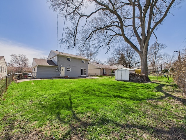 426 Norton Ave, Glendale Heights, IL 60139 - rear view of property with a shed and a fenced backyard