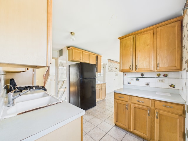 426 Norton Ave, Glendale Heights, IL 60139 - kitchen with freestanding refrigerator, tasteful backsplash, light countertops, and light tile patterned flooring