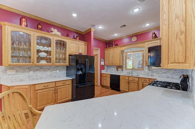 12571 W 3000 N Rd, Bonfield, IL 60913 - kitchen featuring black appliances, crown molding, tasteful backsplash, light wood finished floors, and light stone countertops