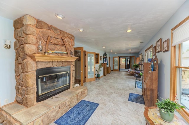 12571 W 3000 N Rd, Bonfield, IL 60913 - living room with plenty of natural light, a fireplace, and recessed lighting