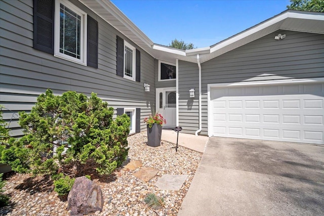 204 Collins Dr, Normal, IL 61761 - view of front of property with driveway and a garage