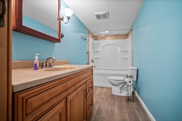 204 Collins Dr, Normal, IL 61761 - full bathroom with vanity, bathtub / shower combination, wood finished floors, and a textured ceiling