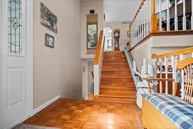 204 Collins Dr, Normal, IL 61761 - staircase featuring baseboards