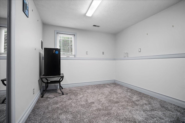 204 Collins Dr, Normal, IL 61761 - empty room with carpet and a textured ceiling