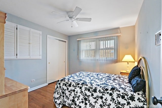 8308 W Leland Ave, Norridge, IL 60706 - bedroom with wood finished floors, a closet, and ceiling fan