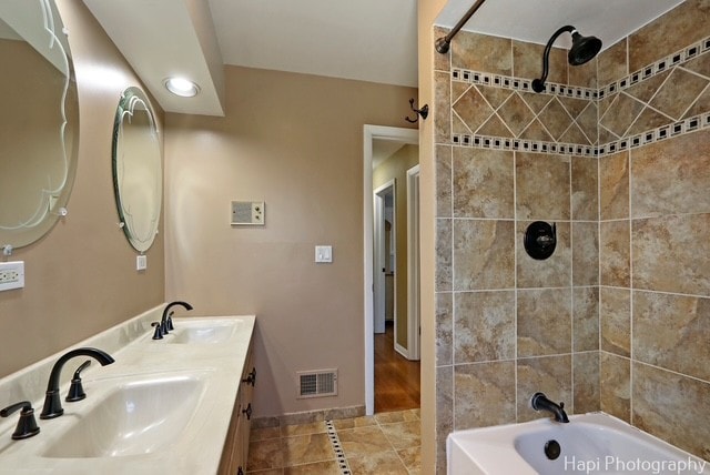 8308 W Leland Ave, Norridge, IL 60706 - bathroom with shower / bath combination, double vanity, and tile patterned flooring