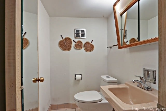 8308 W Leland Ave, Norridge, IL 60706 - bathroom with a sink and tile patterned floors