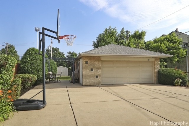 8308 W Leland Ave, Norridge, IL 60706 - detached garage featuring a storage unit