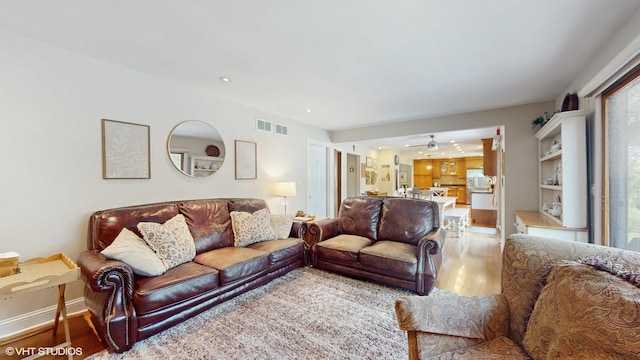 27W558 Ridgeview St, West Chicago, IL 60185 - living room with light wood-type flooring, recessed lighting, and a ceiling fan
