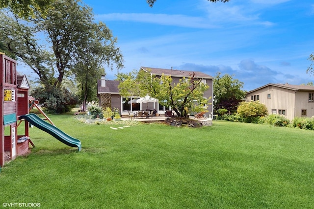 27W558 Ridgeview St, West Chicago, IL 60185 - view of grassy yard with a playground and a patio
