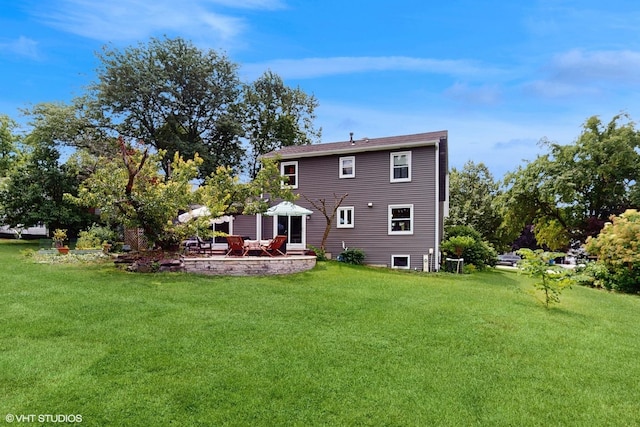 27W558 Ridgeview St, West Chicago, IL 60185 - back of house with a yard and a patio area