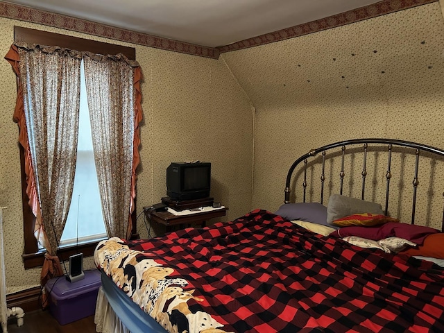 3948 Amelia Ave, Lyons, IL 60534 - bedroom with wallpapered walls and wood finished floors