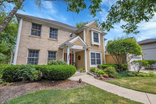 531 N Easy St, Palatine, IL 60067 - view of front of home with a front lawn and brick siding
