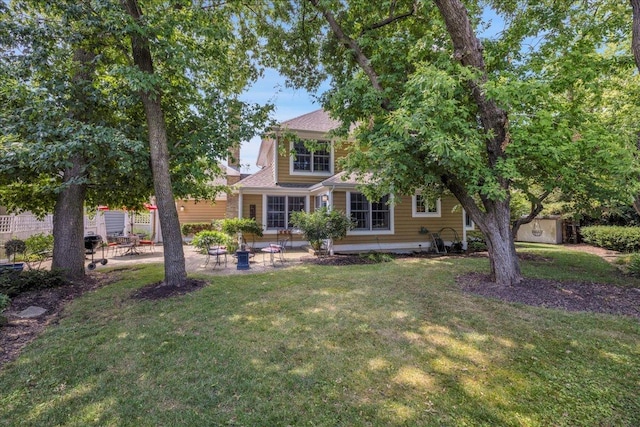 531 N Easy St, Palatine, IL 60067 - view of front facade with a storage unit, a patio area, and a front yard