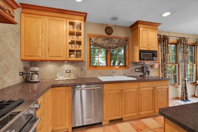 531 N Easy St, Palatine, IL 60067 - kitchen with stainless steel appliances, backsplash, glass insert cabinets, dark stone counters, and recessed lighting
