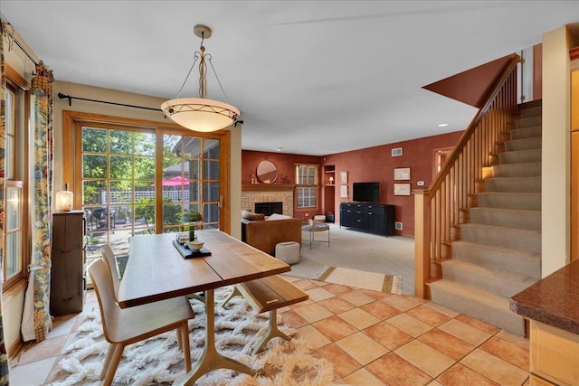 531 N Easy St, Palatine, IL 60067 - dining room featuring stairway, a fireplace, and light colored carpet