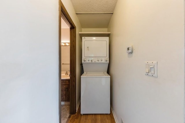 758 Sizer Rd, Gurnee, IL 60031 - laundry area with stacked washer / dryer and light wood finished floors