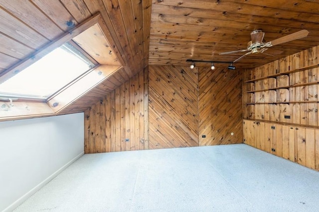 758 Sizer Rd, Gurnee, IL 60031 - additional living space with carpet floors, wood ceiling, lofted ceiling, a skylight, and wood walls