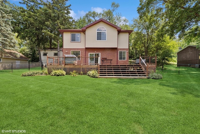 236 Forest Dr, Island Lake, IL 60042 - back of property with a deck, brick siding, a storage unit, and stairs