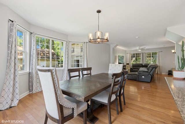 236 Forest Dr, Island Lake, IL 60042 - dining room with a chandelier and light wood-style floors