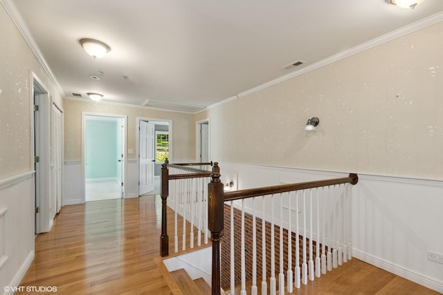 236 Forest Dr, Island Lake, IL 60042 - hall with attic access, an upstairs landing, wood finished floors, and crown molding