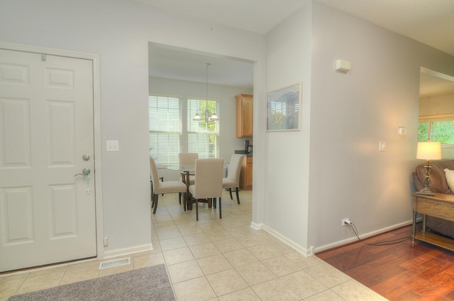 1420 Yellowstone Dr, Streamwood, IL 60107 - foyer featuring light tile patterned floors