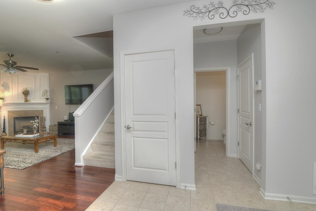 1420 Yellowstone Dr, Streamwood, IL 60107 - hall with stairs and light tile patterned floors