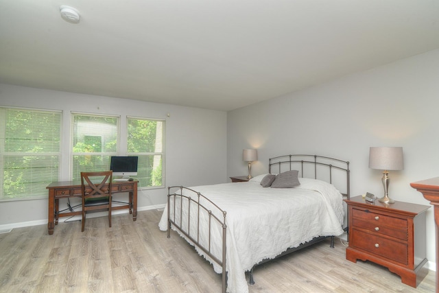 1420 Yellowstone Dr, Streamwood, IL 60107 - bedroom with light wood-style flooring and an office area