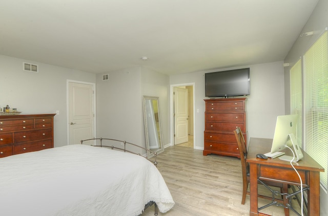 1420 Yellowstone Dr, Streamwood, IL 60107 - bedroom with light wood-style floors and an office area