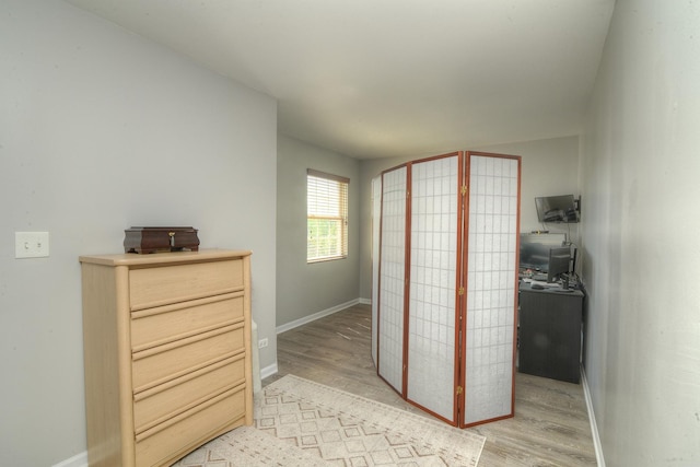 1420 Yellowstone Dr, Streamwood, IL 60107 - corridor with light wood finished floors and baseboards