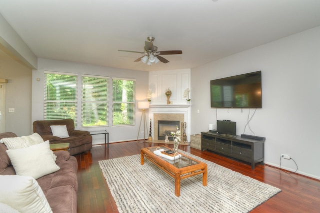1420 Yellowstone Dr, Streamwood, IL 60107 - living room featuring ceiling fan, dark wood-type flooring, and a fireplace with flush hearth