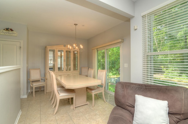 1420 Yellowstone Dr, Streamwood, IL 60107 - dining room with a chandelier and light tile patterned flooring