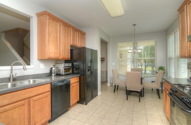 1420 Yellowstone Dr, Streamwood, IL 60107 - kitchen featuring black appliances, dark countertops, light tile patterned floors, decorative light fixtures, and brown cabinetry