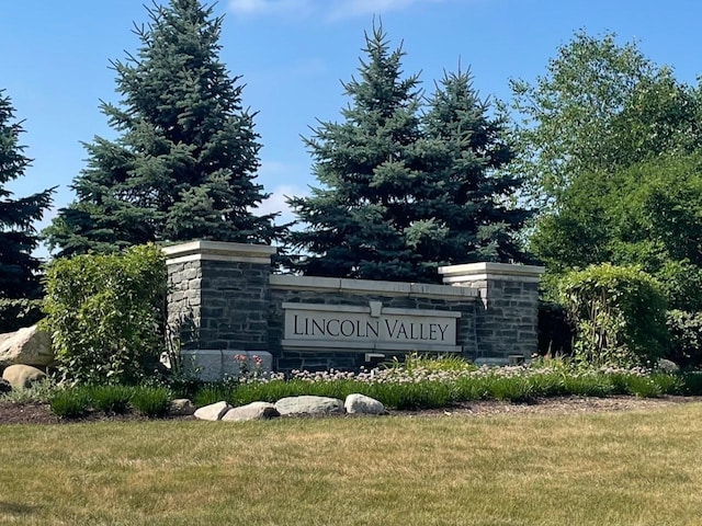 927 Darwin St, North Aurora, IL 60542 - community sign featuring a lawn