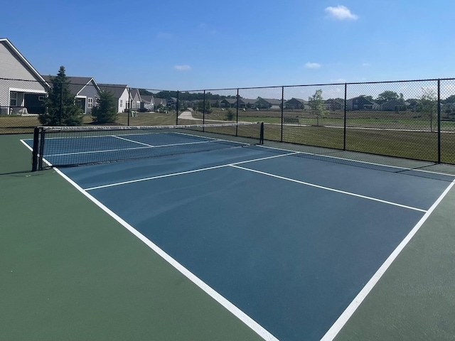 927 Darwin St, North Aurora, IL 60542 - view of tennis court featuring community basketball court and a residential view