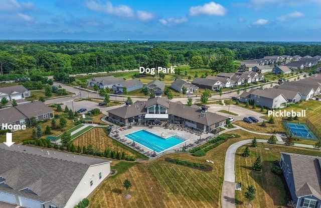 927 Darwin St, North Aurora, IL 60542 - aerial view of residential area with a pool area and a forest