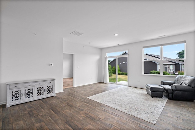 927 Darwin St, North Aurora, IL 60542 - living room with wood finished floors, healthy amount of natural light, and recessed lighting