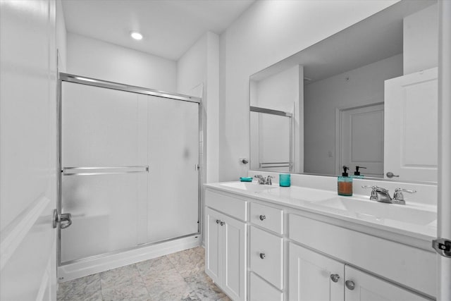 927 Darwin St, North Aurora, IL 60542 - bathroom featuring a stall shower, double vanity, and recessed lighting