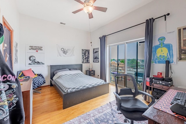 1918 W Cermak Rd Unit 4, Chicago, IL 60608 - bedroom featuring access to outside, wood finished floors, an office area, and a ceiling fan