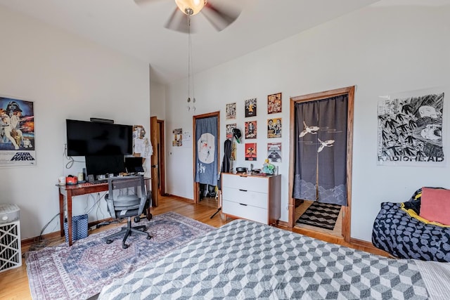 1918 W Cermak Rd Unit 4, Chicago, IL 60608 - bedroom with wood finished floors, a desk, and a ceiling fan