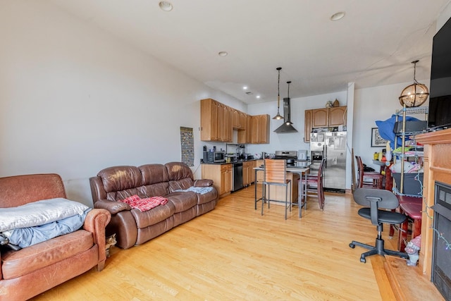1918 W Cermak Rd Unit 4, Chicago, IL 60608 - living room featuring light wood-type flooring, recessed lighting, and a fireplace