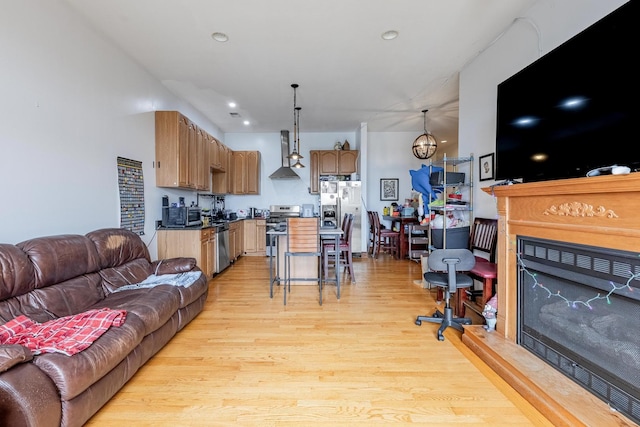 1918 W Cermak Rd Unit 4, Chicago, IL 60608 - living room with light wood-style flooring, a fireplace, and recessed lighting