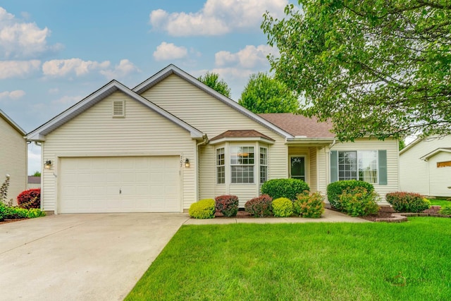 707 Wedgewood Trl, Mchenry, IL 60050 - view of front of property with concrete driveway, a front yard, and a garage