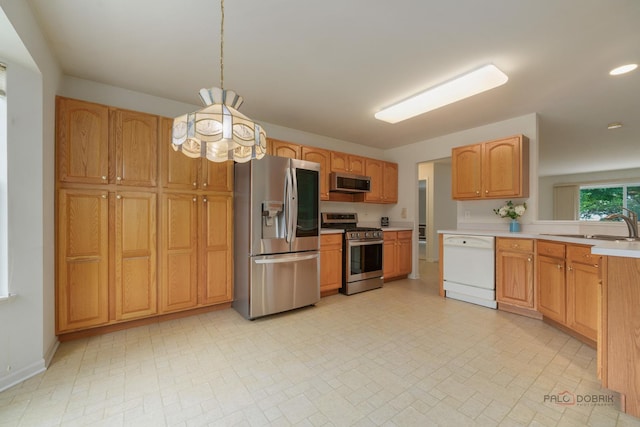 707 Wedgewood Trl, Mchenry, IL 60050 - kitchen featuring stainless steel appliances, light countertops, recessed lighting, and a peninsula