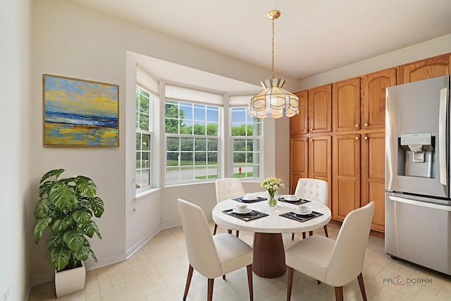 707 Wedgewood Trl, Mchenry, IL 60050 - dining room featuring a chandelier and baseboards