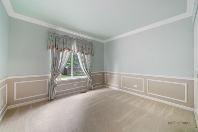 707 Wedgewood Trl, Mchenry, IL 60050 - empty room featuring ornamental molding, carpet, wainscoting, and a decorative wall